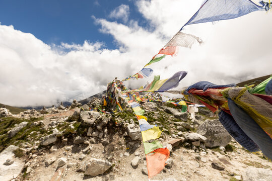 Prayer flags on Kala Patthar summit in the Himalayas