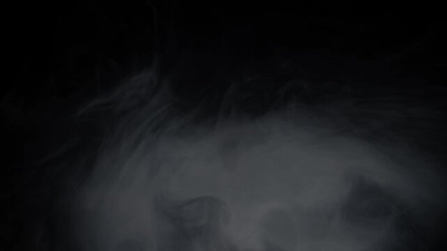 Wispy white ground smoke rolls across the bottom of the screen while bright ember particles rise. Abstract overlay for fire, magic, or dramatic scenes
