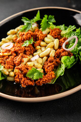 Bean salad tuna canned fish fresh delicious gourmet food background on the table rustic food top view copy space keto and paleo diet vegetarian food pescetarian diet