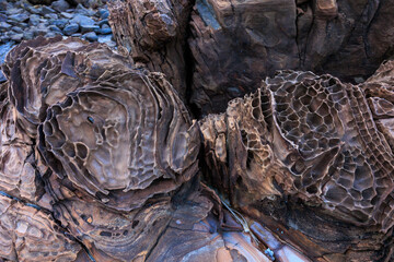 Incredible erosion patterns on rocks along the shore, Thailand