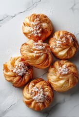 Freshly Baked Sweet Pastries on Marble Countertop Sprinkled with Powdered Sugar Perfect for Dessert or Breakfast Treats Ideal for Food Photography