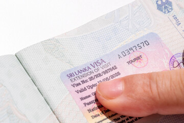 Official Sri Lanka visa extension document, tourist permit with security watermarks and validation...