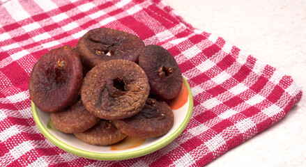 Fresh Figs or Anjeer fruit healthy vegan food concept organic dry fruits on wooden background.