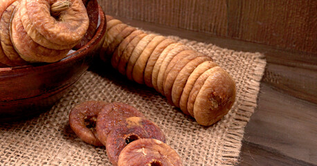 Fresh Figs or Anjeer fruit healthy vegan food concept organic dry fruits on wooden background.