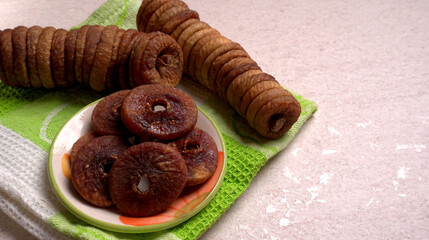 Fresh Figs or Anjeer fruit healthy vegan food concept organic dry fruits on wooden background.