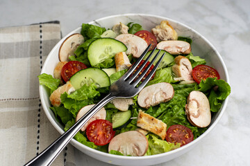 fresh salad top with chicken