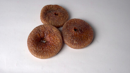 Fresh Figs or Anjeer fruit healthy vegan food concept organic dry fruits on wooden background.