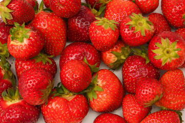 Fresh group of berries isolated on a white background.