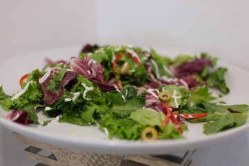 Develop healthy habits with this vibrant video showing a person enjoying a fresh green salad. Ideal...