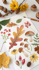 Watercolor painting of mushrooms, leaves, and berries on white paper surrounded by real autumn leaves, acorns, pine cones, and berries with paint palette and brush creating an autumnal atmosphere