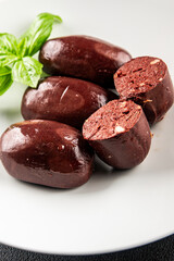 Black pudding sausage fresh delicious gourmet food background on the table rustic food top view copy space