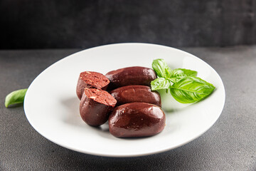 Black pudding sausage fresh delicious gourmet food background on the table rustic food top view copy space