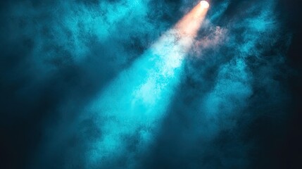 Spotlight beam shining through smoke in darkness, dramatic stage lighting effect for concert, theater or mystery