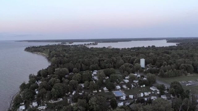Drone over Lake Ontario looking east towards Sodus Point in summer