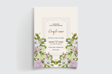 WEDDING INVITATION FRAME WITH FLOWER DECORATIONS AND FRESH LEAVES
