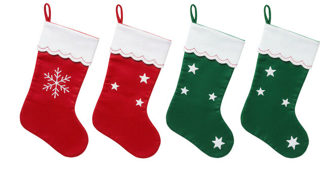 Four christmas stockings in red and green, isolated on transparent background