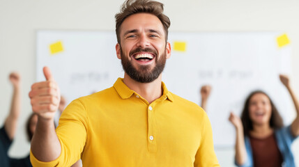 Manager showing thumbs up and smiling while his team celebrates success in the background, in front of a whiteboard