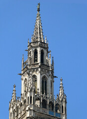 Munich -  the top of the gothic tower of the New City Hall in Marienplatz