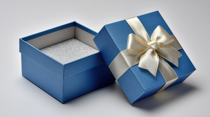 Open Gift: Capturing the anticipation and delight of a beautiful open gift box, adorned with a delicate satin ribbon. A visual representation of thoughtfulness and the joy of giving.