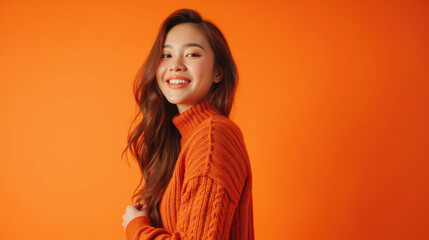 Fototapeta premium Bright smile, cozy sweater, vibrant background, cheerful expression, warm tones, stylish look