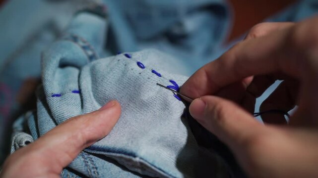 Mending jeans with Sashiko, a traditional Japanese embroidery and stitching technique