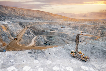 Industry Open coal mine, Drilling machine borer installing cast explosives blasting