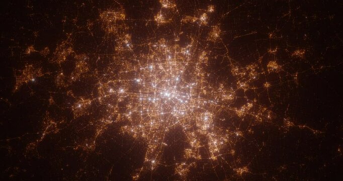 Munich (Germany) aerial view at night. View on modern city from space. Camera is zooming in, rotating counterclockwise