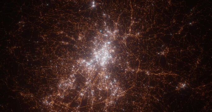 Florence (Italy) aerial view at night. Top view on modern city with street lights. Camera is zooming out, rotating counterclockwise. Vertical video. The north is on the left side