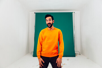 Enthusiastic man in bright studio setting