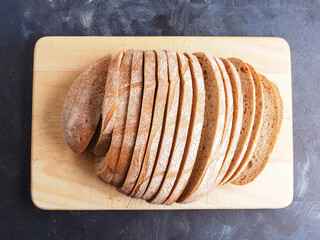Tasty organic rye bread on a wooden cutting board