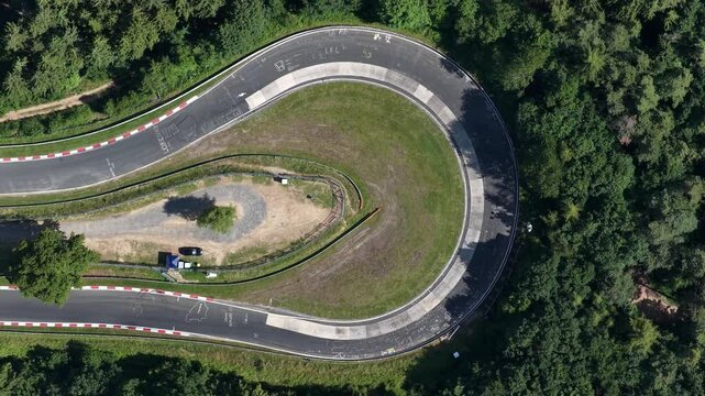 race track in the german Eifel near Nurburg, Germany. Race circuit, car adn motorsports. Aerial drone video