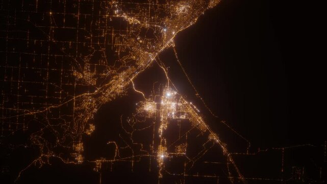 Duluth (Minnesota, USA) aerial view at night. Top view on city from space. Camera is zooming in, rotating clockwise