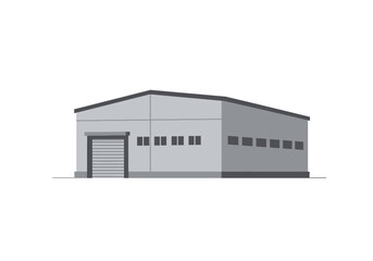 A gray warehouse stands alone with a large rolling door  rows of small windows on both visible sides © Adi