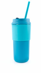Bright turquoise beverage tumbler with straw