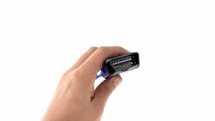 Connector held in hand against white background