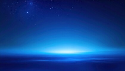 Tranquil ocean at twilight, with deep blue hues blending into the starry sky above, evoking calm