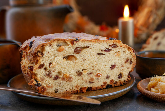 Traditional Irish Halloween Homemade fortune-telling Bairin Breac or Barmbrack Bread  or Tea Break with honey butter