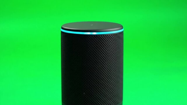 Smart Speaker Voice Assistant Device on Green Screen with Changing Colors
