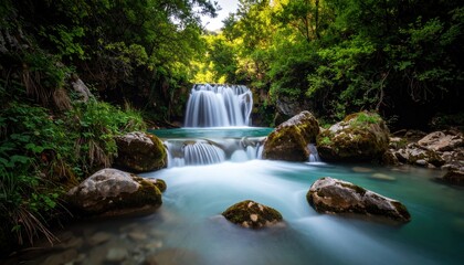 Fototapeta premium Peaceful Waterfall Cascading Over Rocks In Lush Forest