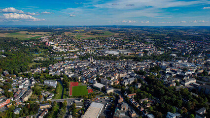 Aerial panorama view of the old town of the city Hof on a sunny noon in summer in Germany.