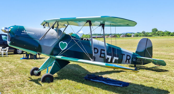 Breclav, Czech Republic, Air day Breclav 2025 &ndash; June. 21. 2025 Vintage Biplane Aircraft Jungmann Display Show Aerobatics Sunshine Sky .B&uuml;cker B&uuml; 131