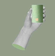 Card in hand, close-up of bank transaction. Paying for purchase with electronic payment, secure
