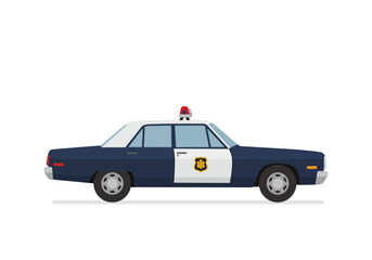 Fototapeta premium A blue and white police car with a red light on top