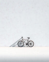 Leaning Bicycle in Quiet Minimal City Setting