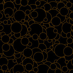 Yellow round shapes scattered in a non-uniform layout on a black background, forming a fun and seamless vector print with high contrast