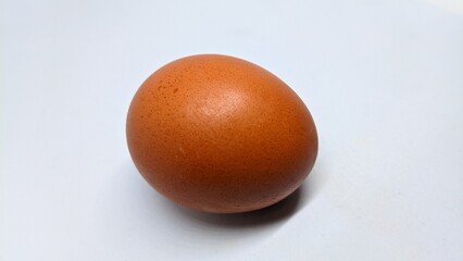 Close-up chicken egg isolated on white background