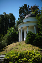 This is a tranquil and picturesque park featuring a beautiful gazebo.