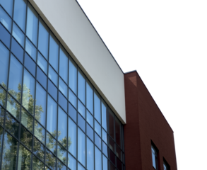 Modern urban building exterior with glass windows and concrete facade. Business office property