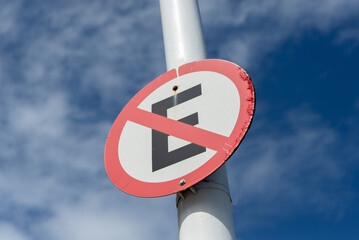 traffic sign informing that stopping is prohibited. Street