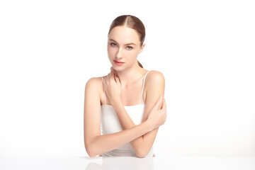 A beautiful young woman with clean, fresh skin against a white background. Skincare, facial...